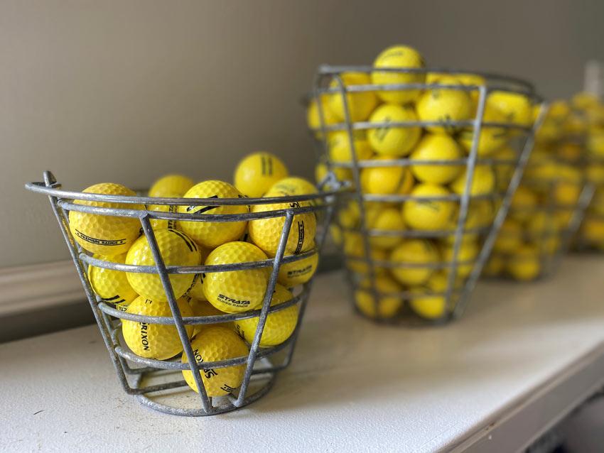 Golf balls in range bucket 